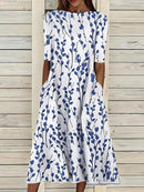 Sela™ – Summer Midi Dress with Round Neckline and Coastal Floral Print