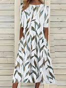 Sela™ – Summer Midi Dress with Round Neckline and Coastal Floral Print